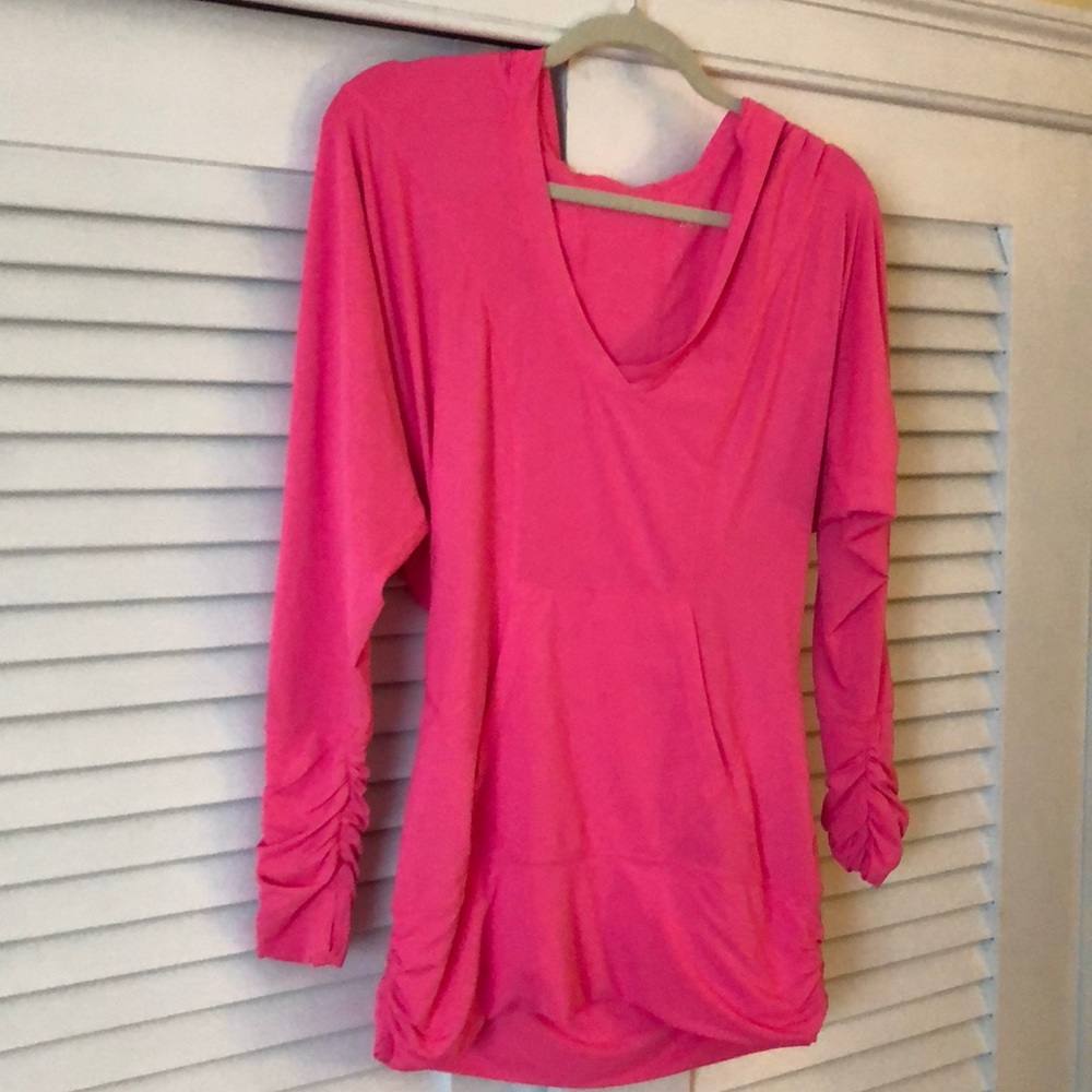 Hot pink goddess workout pullover by Zella.
